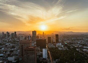 Aerial panorama of the Mexico City skyline at golden hour